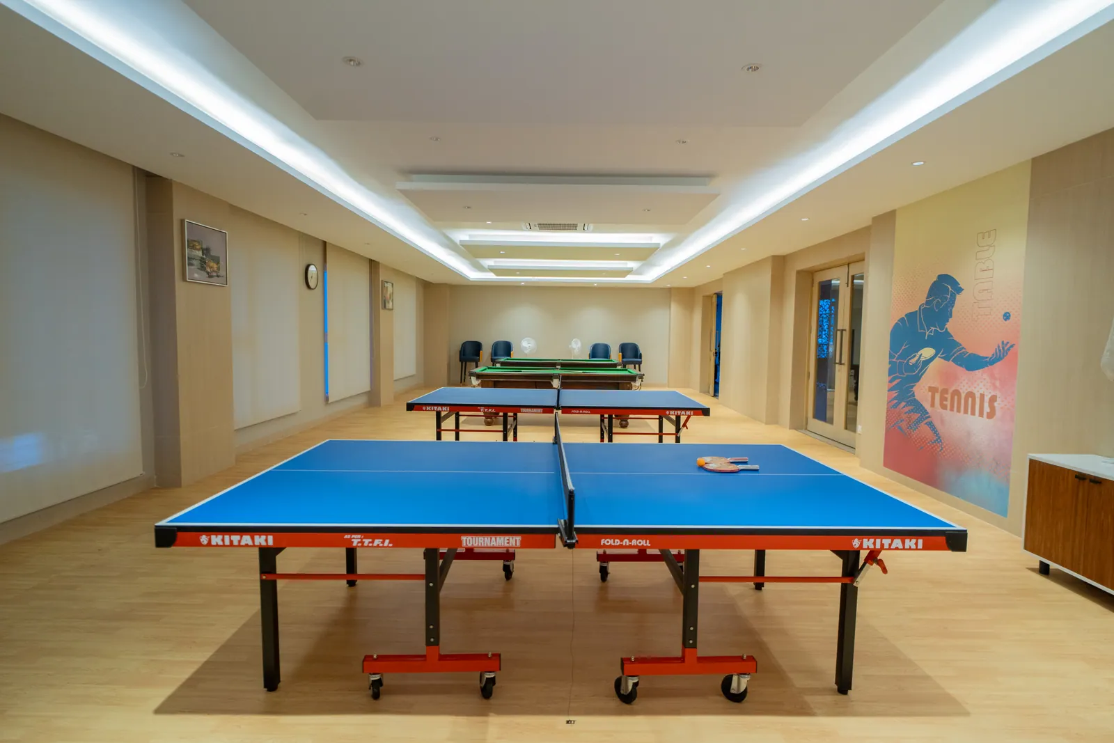 Indoor games room with table tennis tables