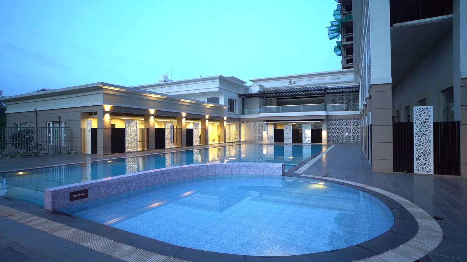 Outdoor swimming pool at dusk